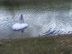 wetting gown in lake , wetting