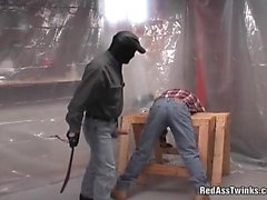 Weird masked guy bands over and gets ass spanked and
