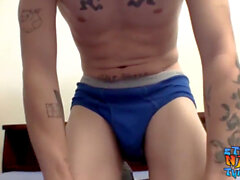 tattooed homosexual thug plays with his enormous shaft solo