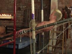 Nubile twink Izan Loren swallows cock before wax torment