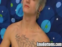 He is a sexy blonde haired punk who is masturbating