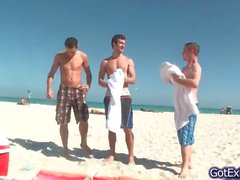 Hot gay threesome having fun under