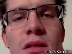 Nerdy stud Lex exhales smoke during masturbation