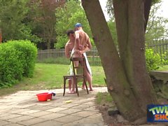 Hung twinks play wet outdoors