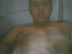 Hot latin daddy streaping and jerking off
